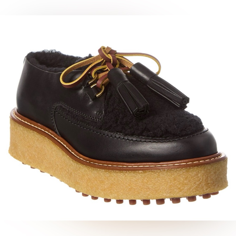 Tod’s Leather and Shearling Platform Loafer